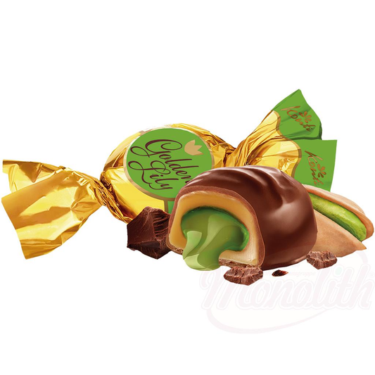 Confiserie au caramel "Golden Lily" fourré à la pistache (21,8 %) et enrobé de cacao (22 %)