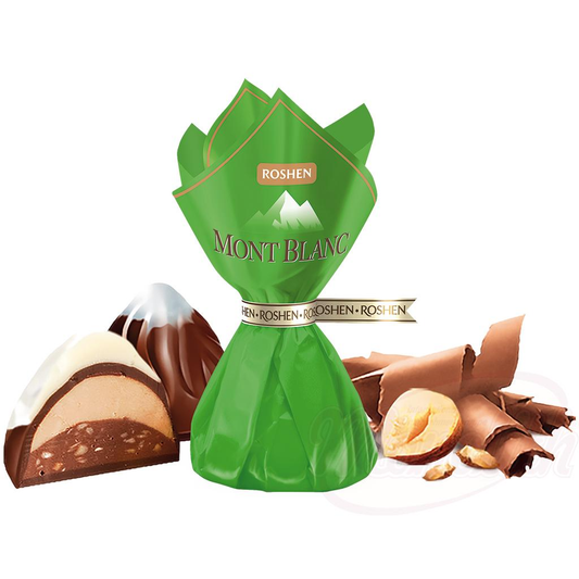 Confiserie "Monblan" fourrée de crème (24%) avec des noisettes hachées et moulues, décorée de chocolat blanc (9%)/lose